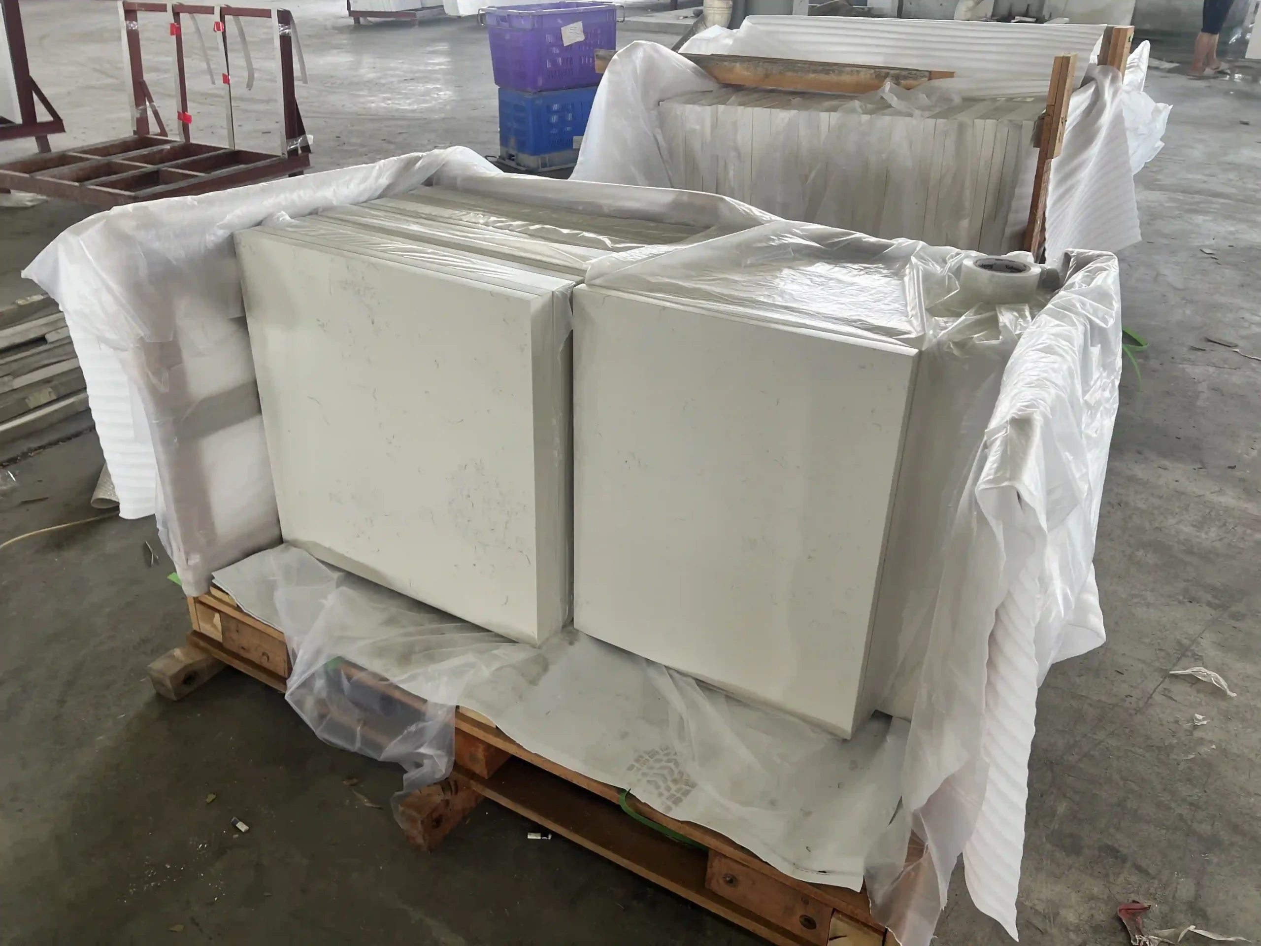 White quartz countertops wrapped and secured for transportation