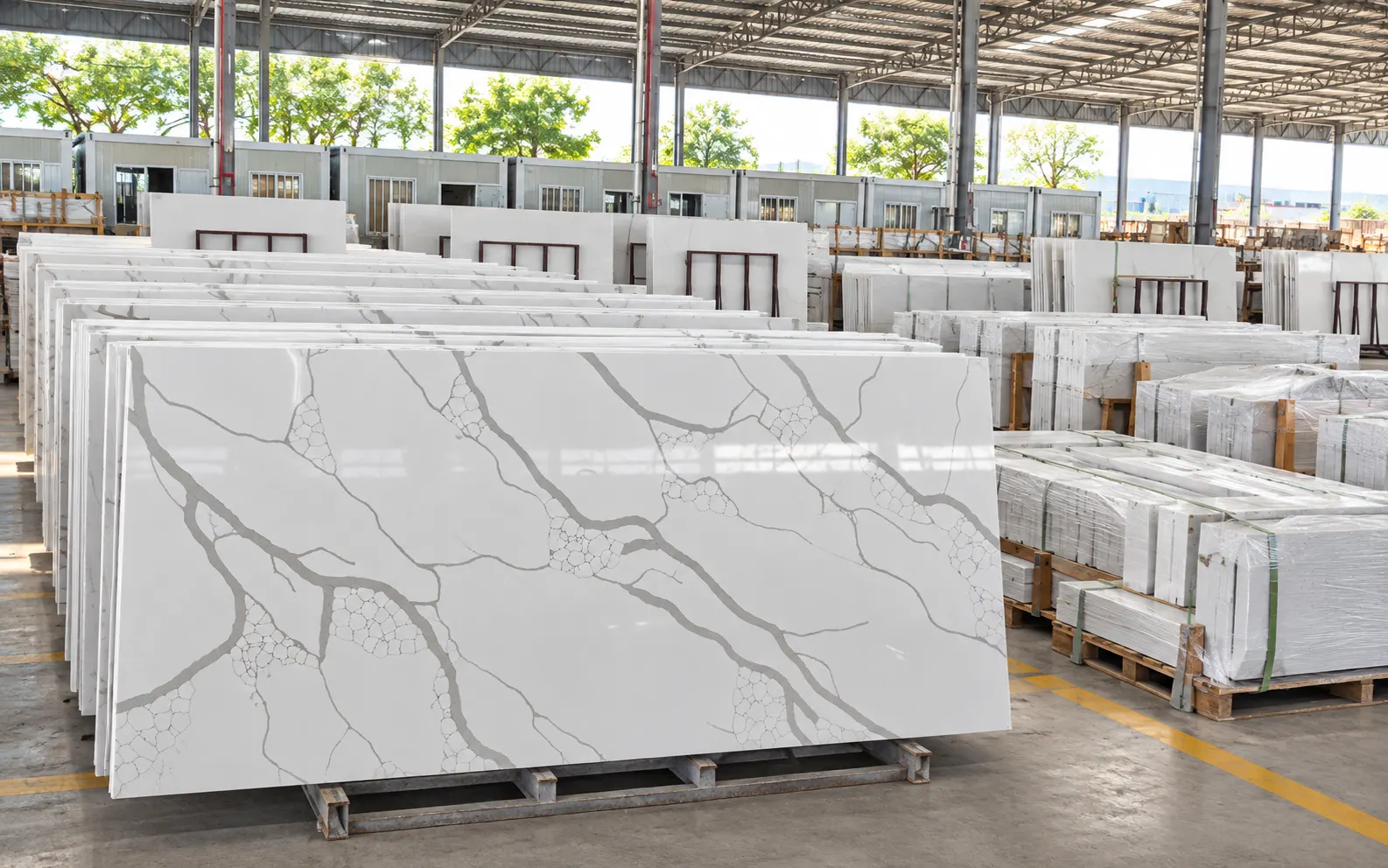 Quartz countertops prepared for an apartment building project in organized factory production