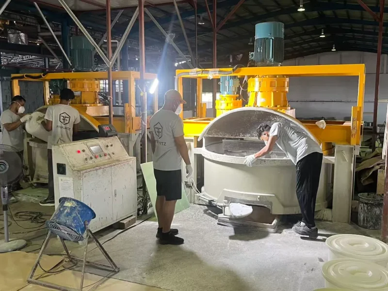 Malaysia quartz factory workers operating engineered quartz slab production equipment